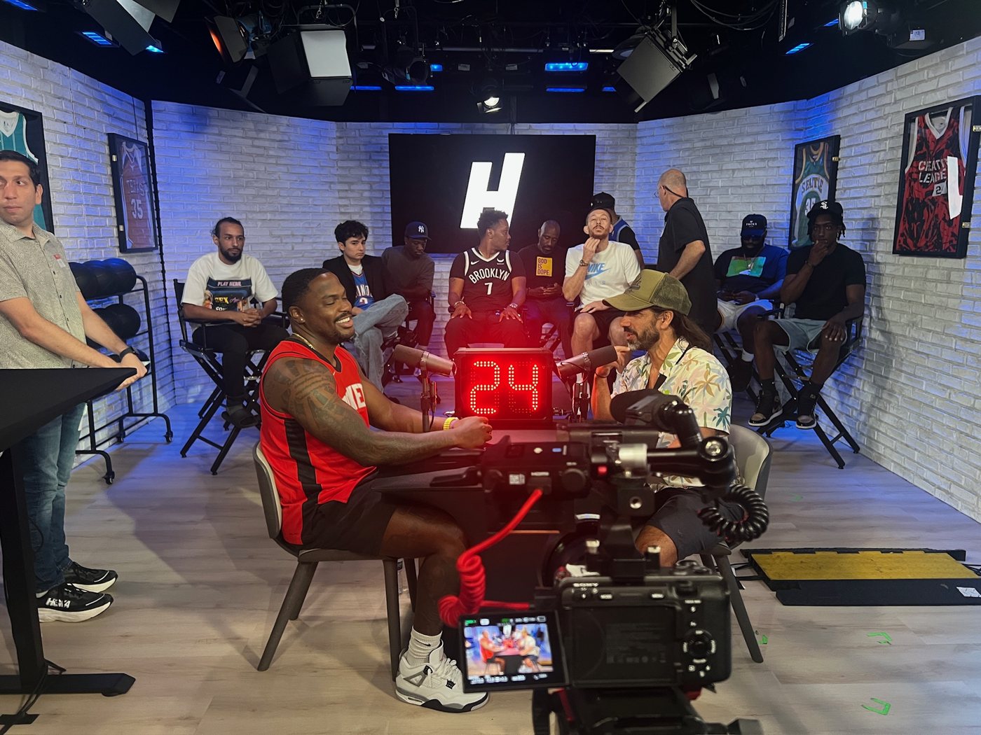 Wide view of the House of Highlights studio with a live audience